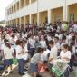 C1 School children gathered in the schoolyard