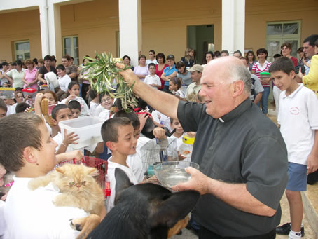 C9 Sprinkling holy water on kids and pets