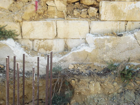 B5 July 23 wall behind which lie graves