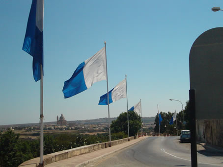 A9 Flags on main road approaching Xaghra