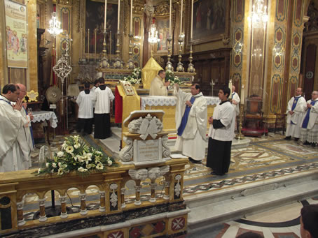 B2 Archpriest incensing concelebrating priests