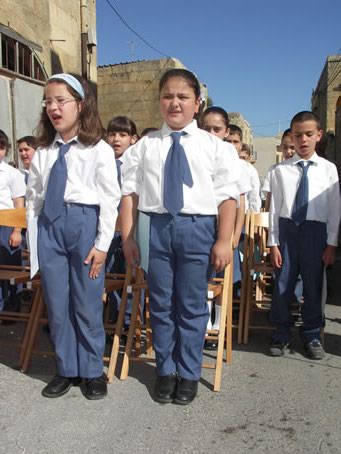 D2 The young School Choir singing the National Anthem