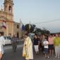 D2 Fr Joseph Cini leads the faithful in procession