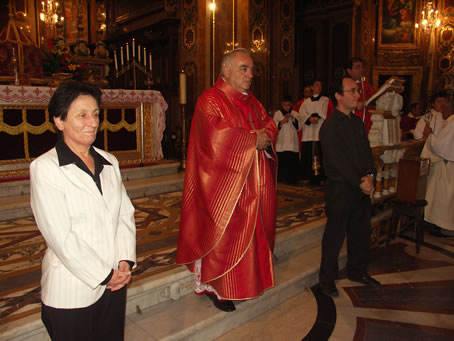 J3 Mgr Attard flanked by Catechists