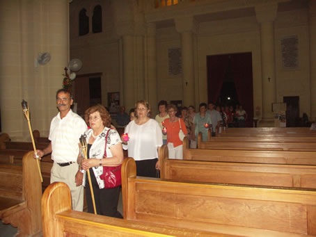 G4 Candles in hand the Pilgrims walk to the Chapel