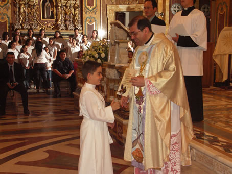 J3 Archpriest hands certificate of the occasion