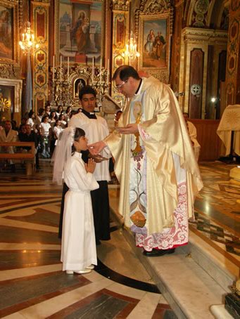 I3 Receiving Holy Communion for the first time