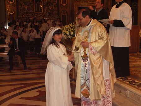 J5 Archpriest hands certificate of the occasion