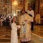 J7 Archpriest hands certificate of the occasion