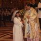 J5 Archpriest hands certificate of the occasion