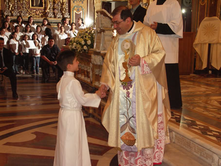 J2 Archpriest hands certificate of the occasion