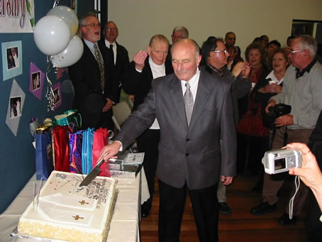 C1 Fr Emanuel cutting the cake