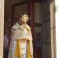 A5 Mgr Archpriest, emerges at Church door with the Holy Eucharist