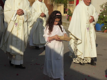 E4 young girl showers the street with petals