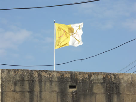 A1 Papal flag flies in the breeze