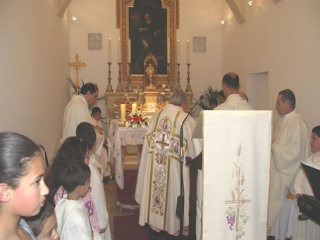 A3 Bishop Cauchi incensing the Altar