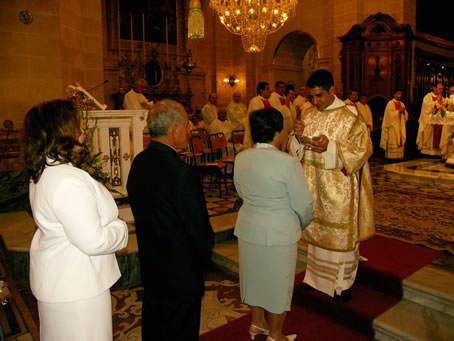 H7 Deacon Bajada gives Holy Communion to his parents