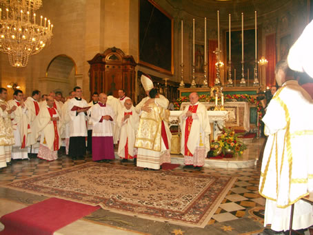 E8 Bishop embraces Deacon Anthony Bajada