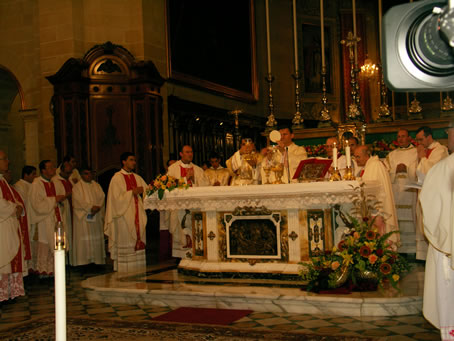 H2 Deacon Curmi assists the Bishop at Mass