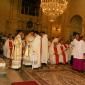 E3 Fr Michael Curmi assists his brother Deacon Joseph putting on the dalmatic