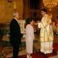 H8 Deacon Curmi gives Holy Communion to his parents