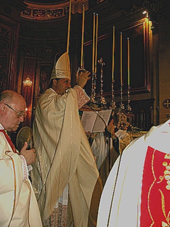 I4 Bishop imparts benediction at end of Mass