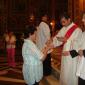 A9 Rev Richard Farrugia distributing Holy Communion