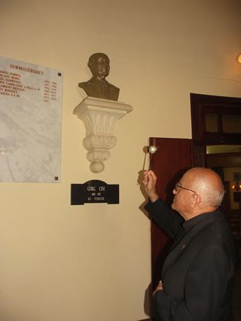 E1 Society Chaplain blesses the plaque