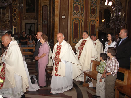 A6 Celebrants move to the Altar