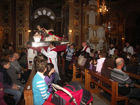 B2 Statue being carried down the nave