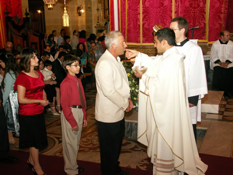 L9 Fr Bajada during Holy Communion