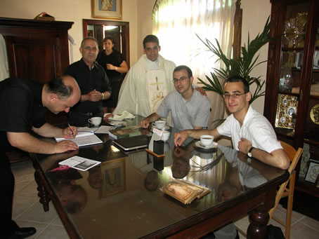 L3 In the sacristy celebrating with fellow seminarians