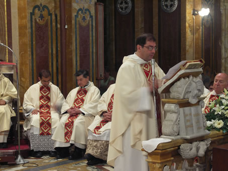 A6 Archpriest reading Bishop's letter