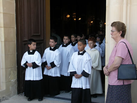 G1 Altar boys leave the church