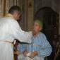 E2 Can J Bartolo administering Holy Communion