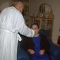 E6 Can Julian Refalo Rapa administering Holy Communion