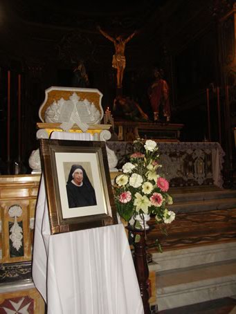 A2 Photo of Sr Cherubina in front of ambone