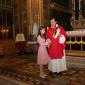 H2 Archpriest hands certificate of Confirmation