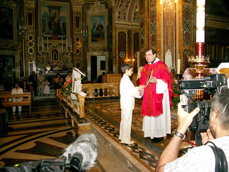 F9 Archpriest hands certificate of Confirmation