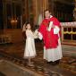 H1 Archpriest hands certificate of Confirmation