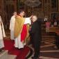 B8 Mgr Archpriest praying over the couple