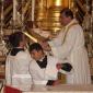 G2 Archpriest hands effigy to Seminarian