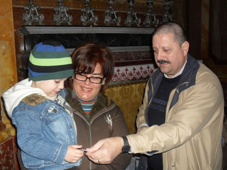 D6 Handing stickers to a child