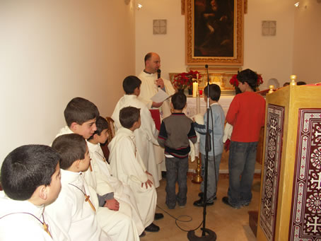 A6 The boys approach the altar