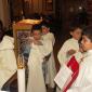 B3 Young altar boys help the new ones