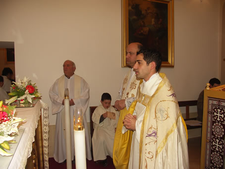 G3 Deacon Ant Bajada in prayers before benediction