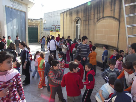 E9 Children gather in front of the Church