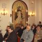 F7 Congregation in front of Niche with the Saint's Statue