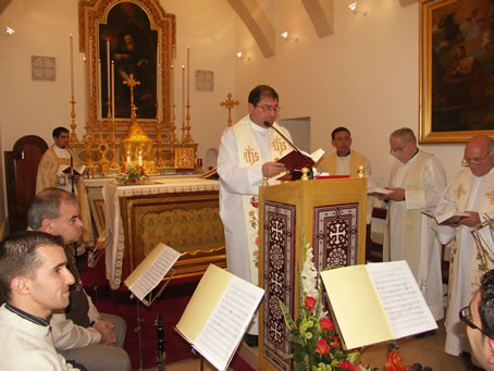 A4 Archpriest Mgr Carmelo Refalo singing at Vespers