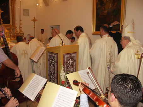 A9 Concelebrants arrive at the Altar